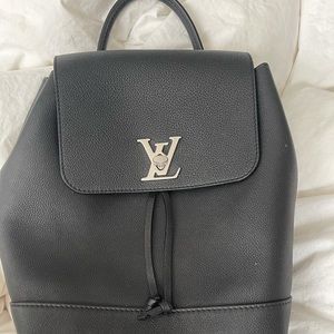 Louis Vuitton backpack lock me